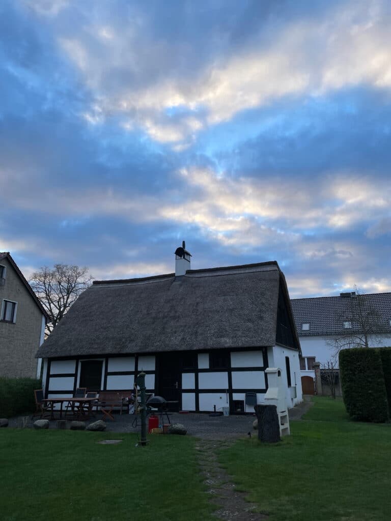 myth maker farm under a dramatic sky