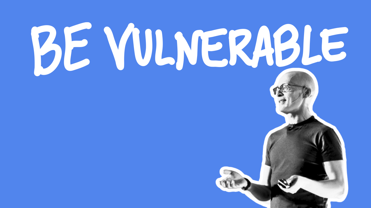 Why Do Some People Have Confidence And Others Struggle? 1 Matteo Cassese with BE VULNERABLE message on blue background during motivational talk.