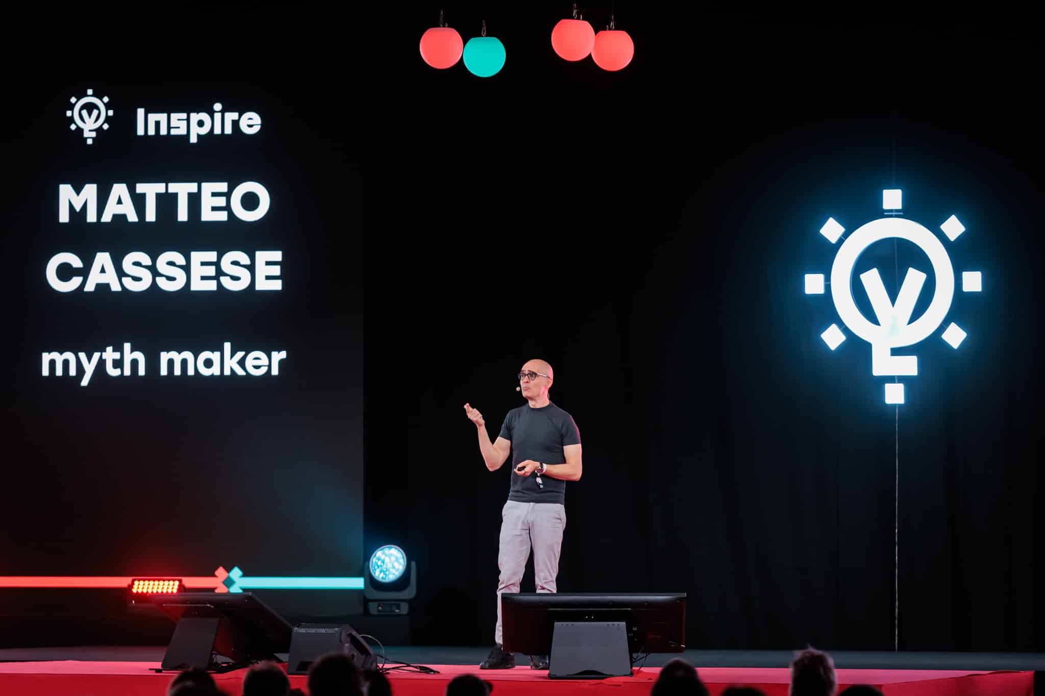 Matteo Cassese presenting on stage at Infoshare conference in Gdansk 2025.