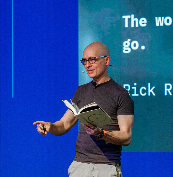 Matteo Cassese 14 Matteo Cassese delivers motivational presentation on stage at Alte Münze Berlin 2025.