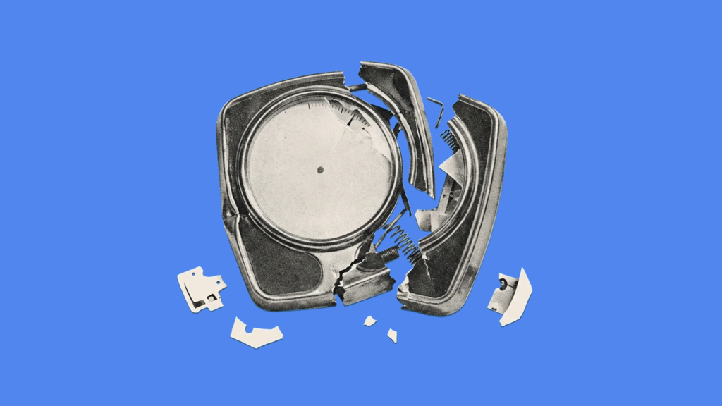 A shattered vintage bathroom scale