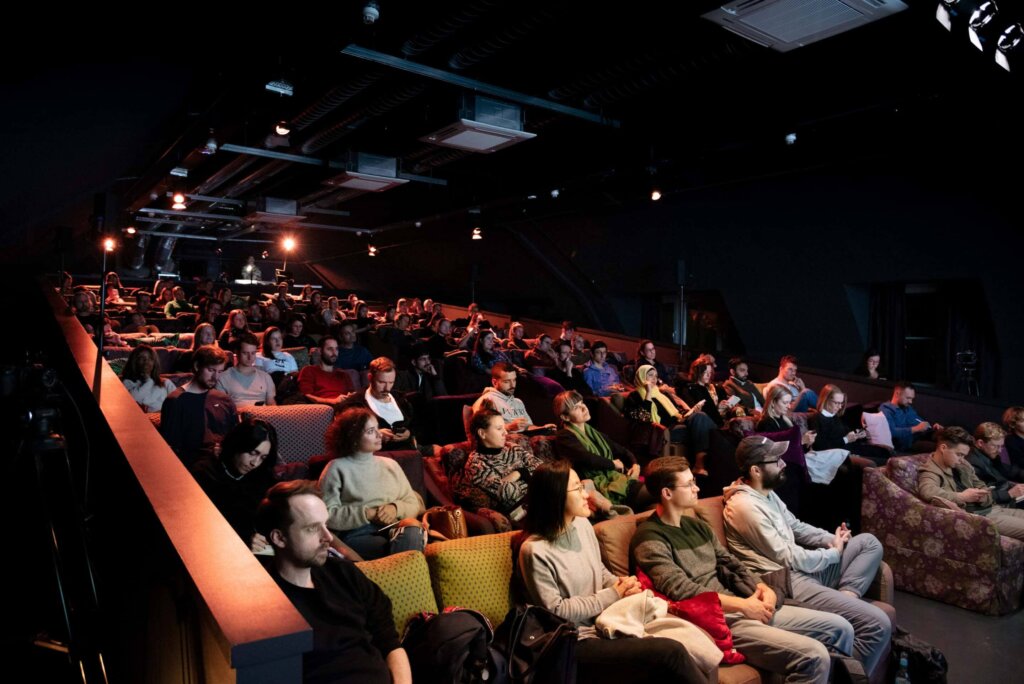 Audience listening to Matteo Cassese keynote